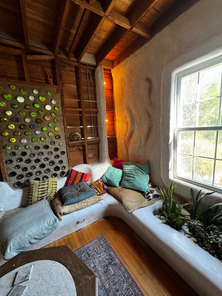 Plaster window bench with built-in planter at The Tavern